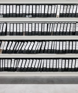 Shelves of box folders